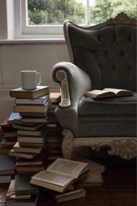 mug and pile of books